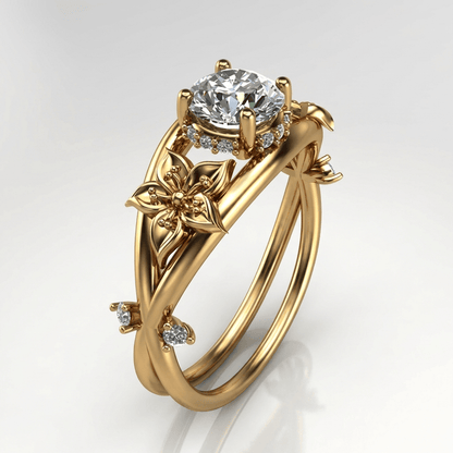 Ring Rose & Oliver mit goldenem Zirkonia in Blumenform, zartes und elegantes Design für besondere Anlässe.