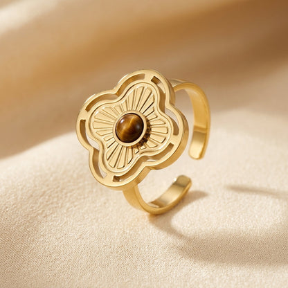Anel aberto dourado com detalhes florais delicados, da marca Rose & Oliver, com acabamento elegante e acabamento refinado.
