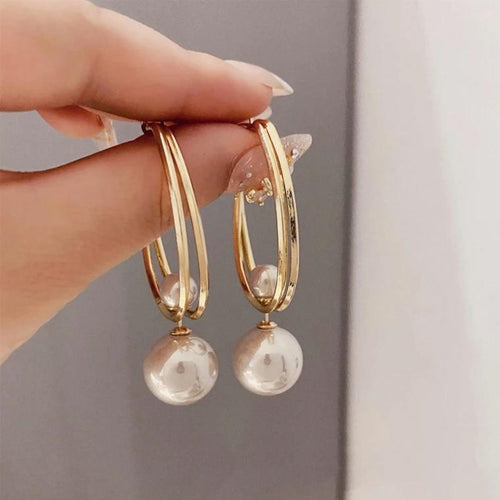 Pendientes Vintage Charmming con perlas de la marca Rose & Oliver, detalles elegantes y acabamento clásico en oro rosé.