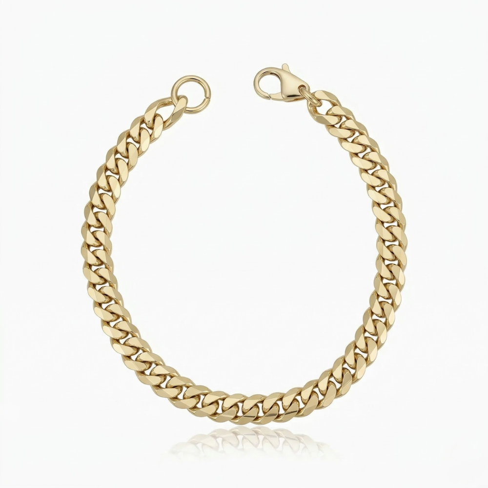 Pulsera cubana en oro de Rose & Oliver, detalle de eslabones anchos y acabado brillante.